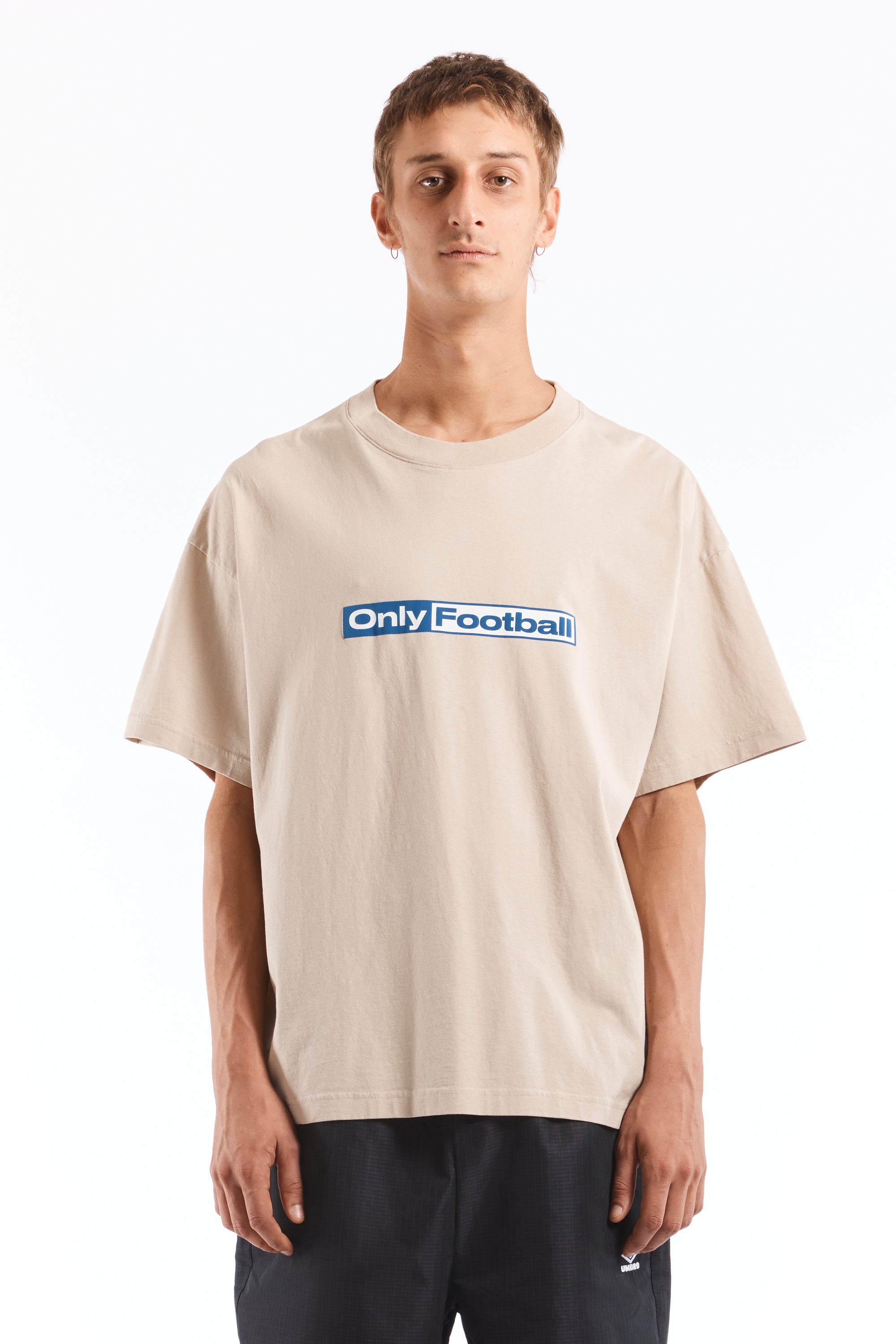 The Only Football T Shirt Ivory available online with global shipping, and in PAM Stores Melbourne and Sydney.