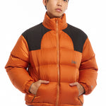 The STREAM DOWN JACKET ORANGE available online with global shipping, and in PAM Stores Melbourne and Sydney.