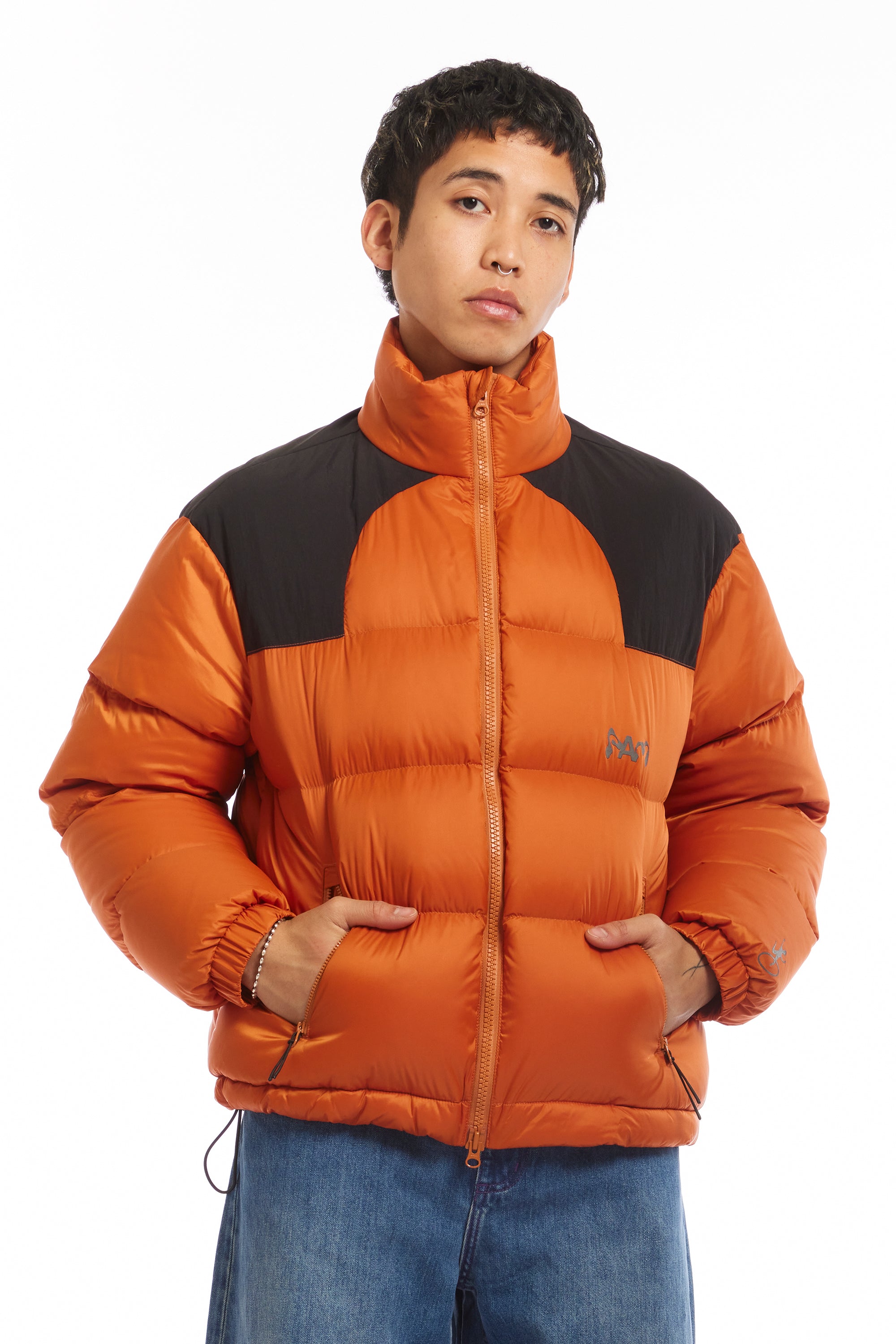 The STREAM DOWN JACKET ORANGE available online with global shipping, and in PAM Stores Melbourne and Sydney.