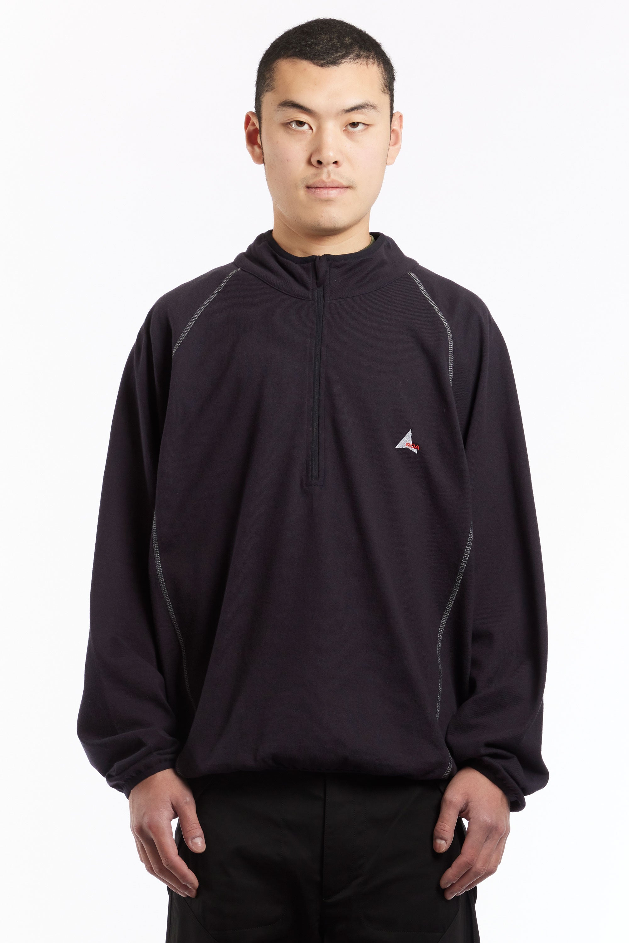The ROA - JERSEY HALF ZIP  available online with global shipping, and in PAM Stores Melbourne and Sydney.