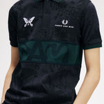 The Perks And Mini X Fred Perry Polo Shirt available online with global shipping, and in PAM Stores Melbourne and Sydney.