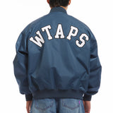The NYLON TWILL TEAM JACKET TEAL available online with global shipping, and in PAM Stores Melbourne and Sydney.