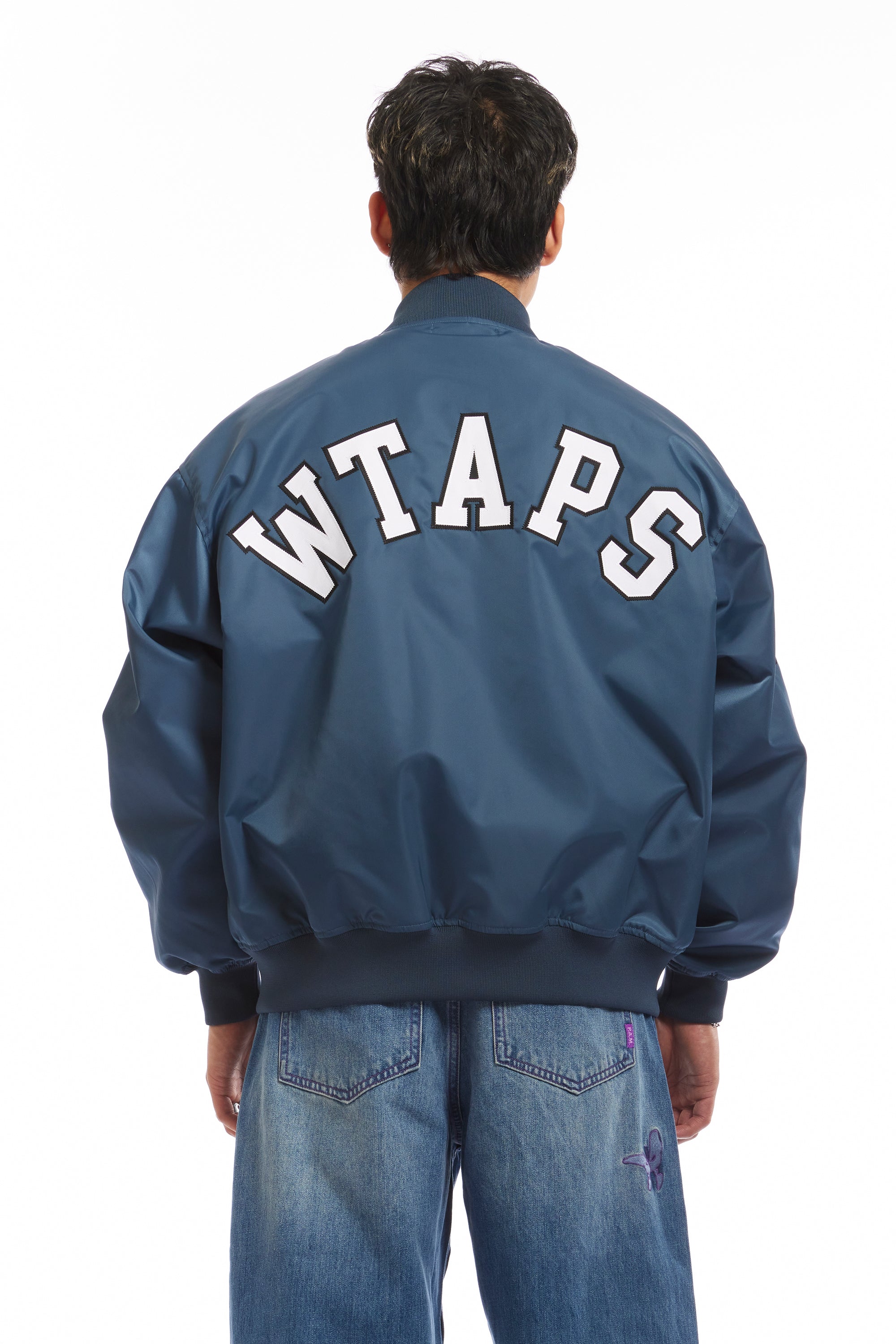 The NYLON TWILL TEAM JACKET TEAL available online with global shipping, and in PAM Stores Melbourne and Sydney.