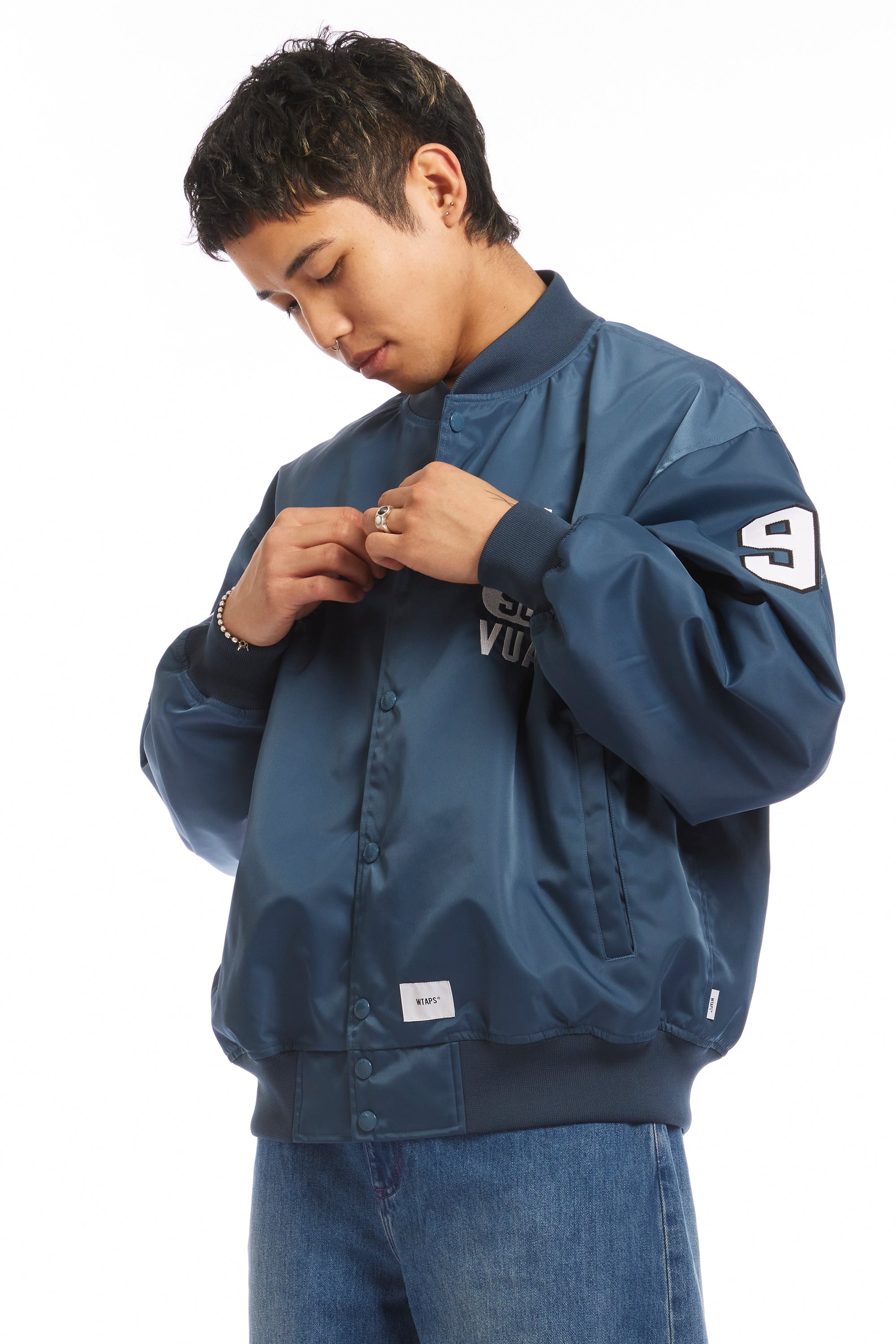 The NYLON TWILL TEAM JACKET TEAL available online with global shipping, and in PAM Stores Melbourne and Sydney.