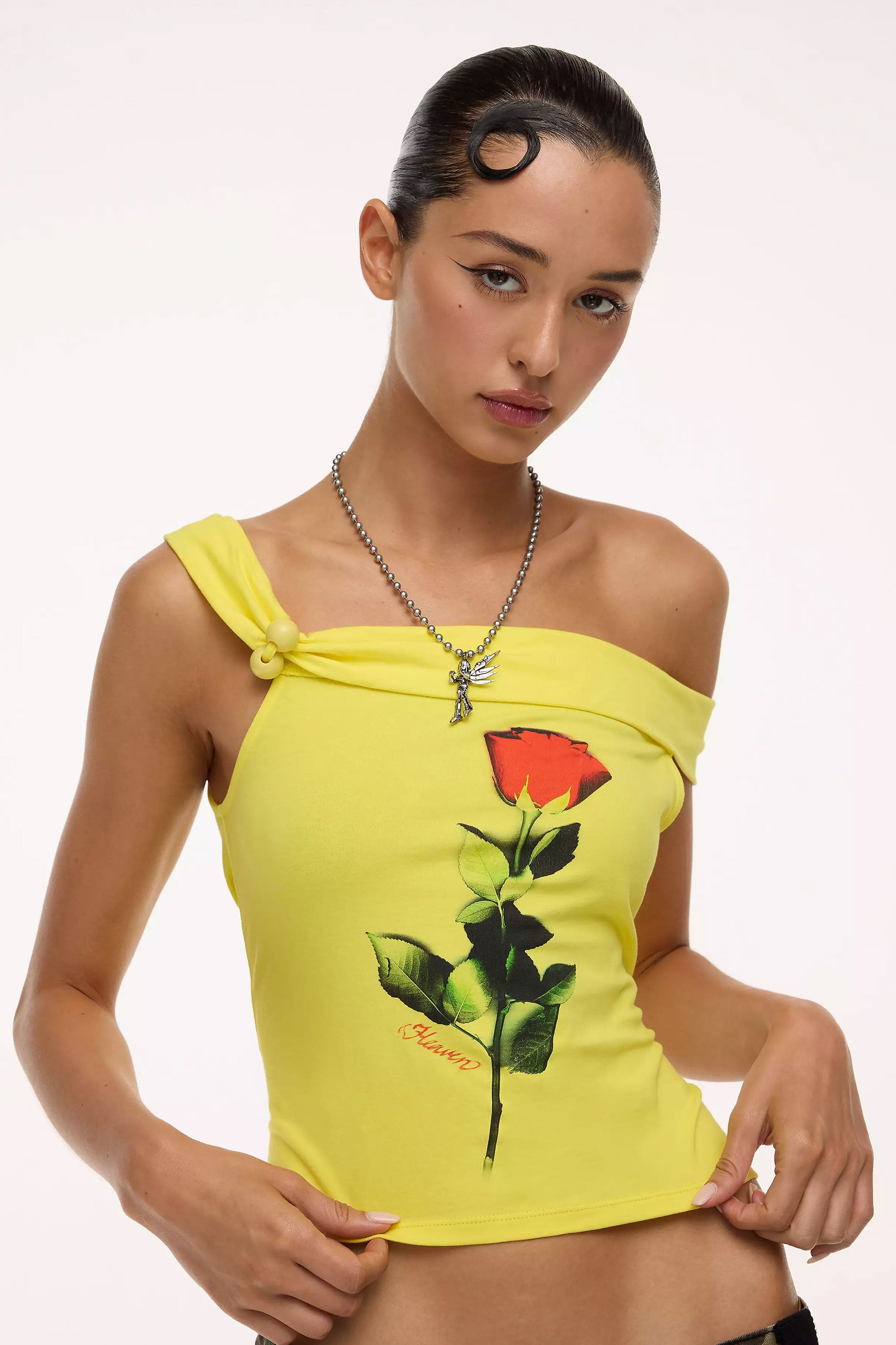 The HEAVEN - ONE SHOULDER ROSE BAUBLE TANK  available online with global shipping, and in PAM Stores Melbourne and Sydney.