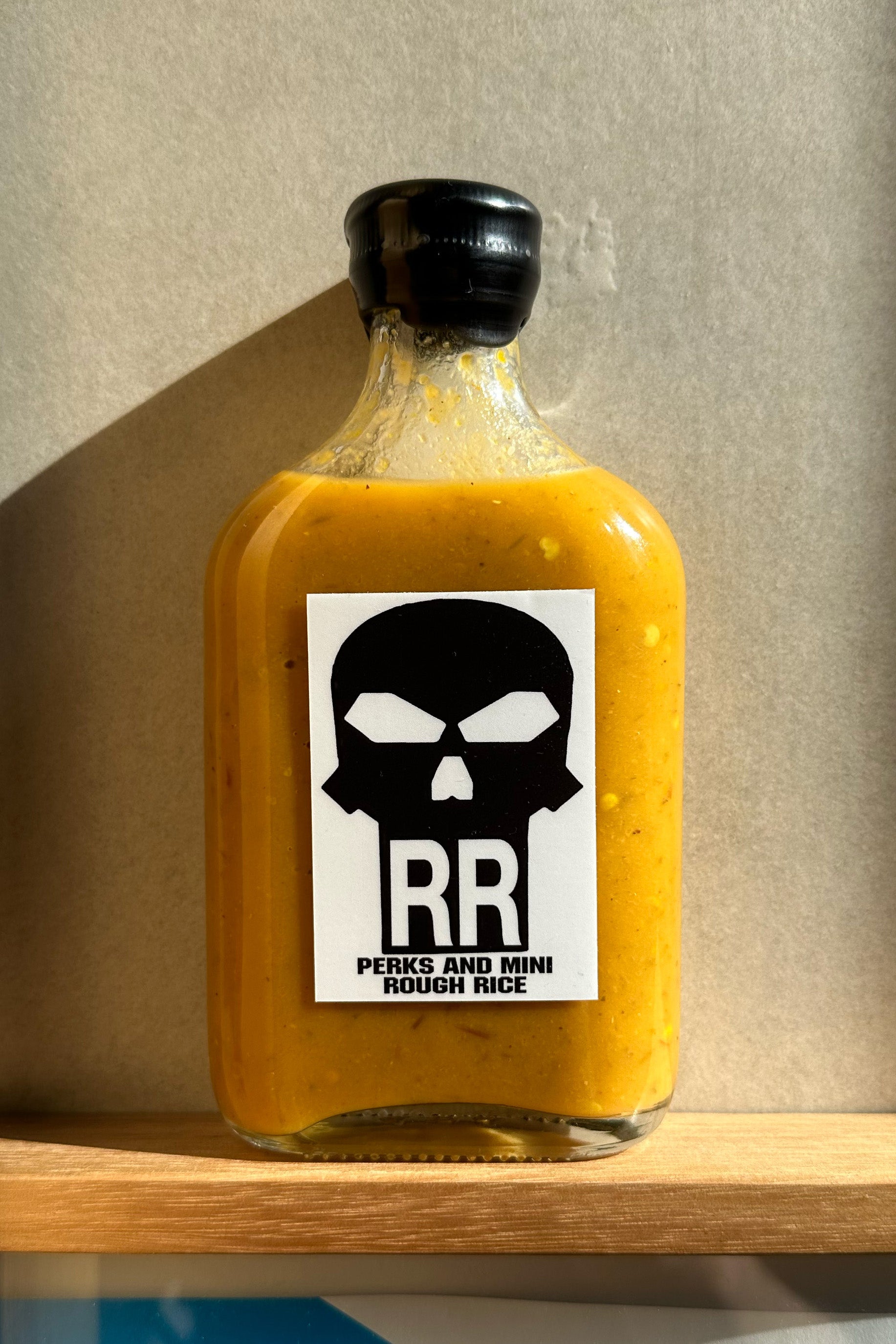 The P.A.M. x ROUGH RICE - HOT SAUCE  available online with global shipping, and in PAM Stores Melbourne and Sydney.