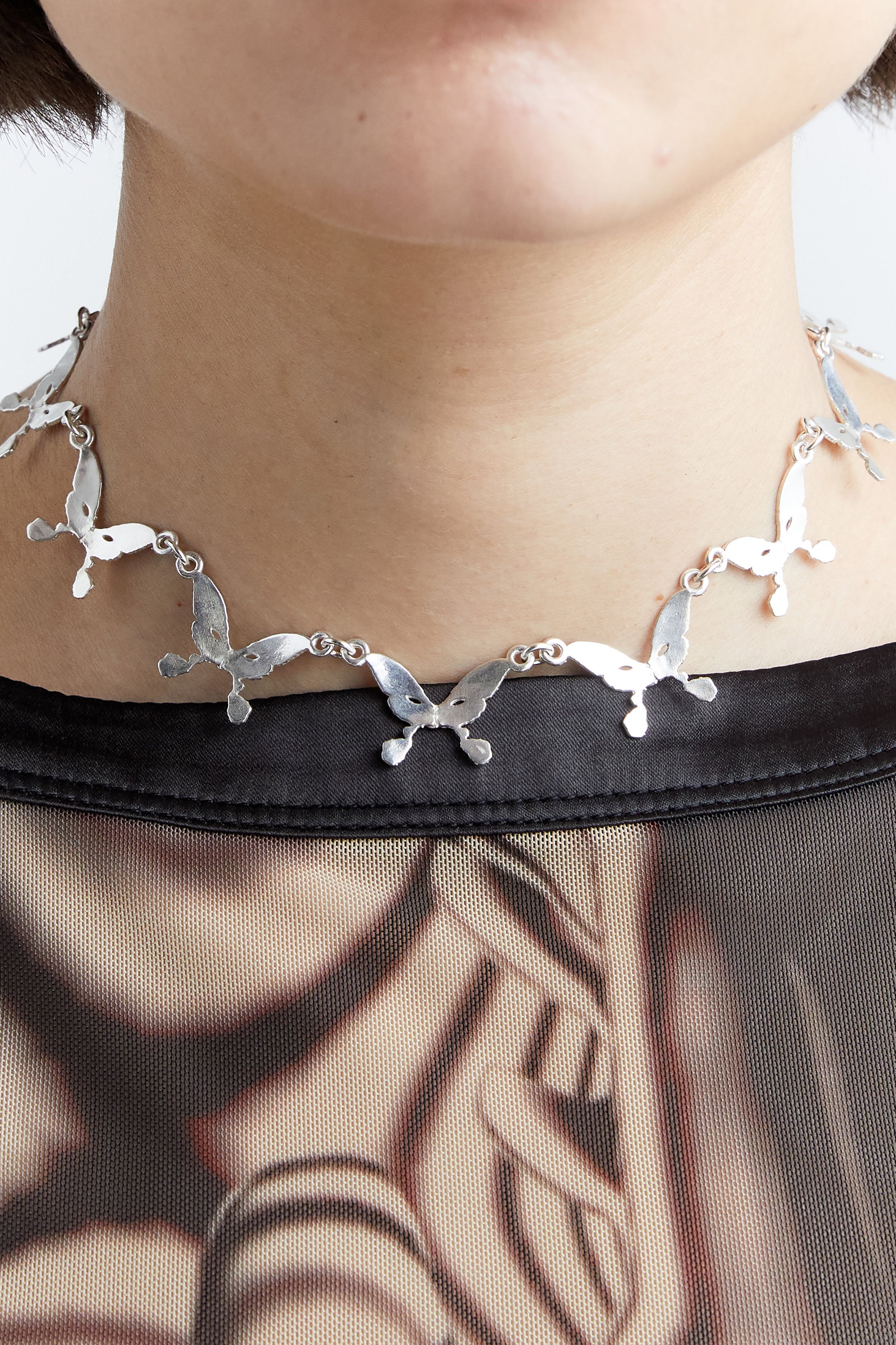 The PAM X UNDERGROUND SUNDAE Continuous Butterfly Choker available online with global shipping, and in PAM Stores Melbourne and Sydney.