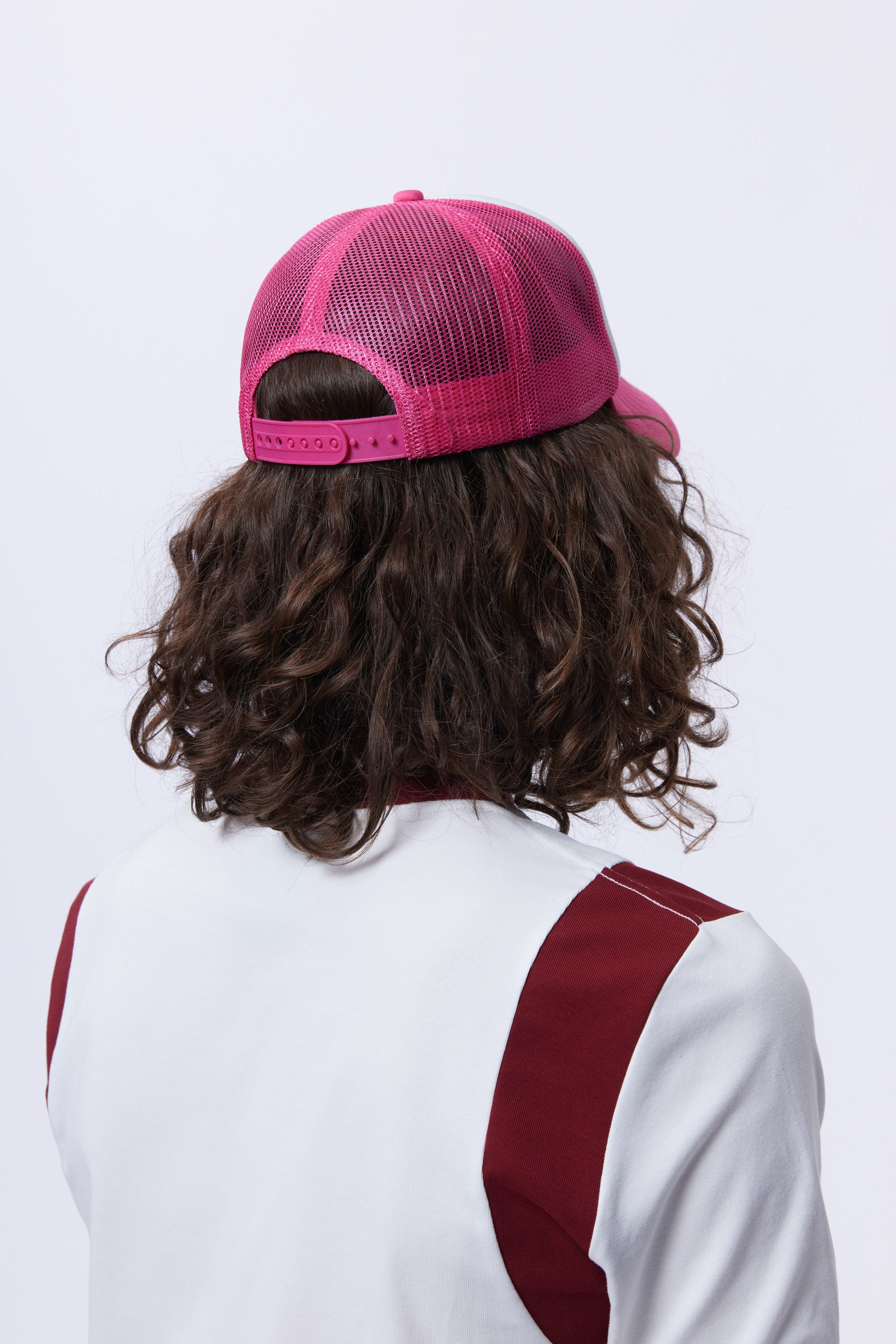 The LOVE ON THE LINE TRUCKER CAP  available online with global shipping, and in PAM Stores Melbourne and Sydney.
