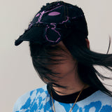The ALIEN KISS FRAYING BASEBALL CAP  available online with global shipping, and in PAM Stores Melbourne and Sydney.