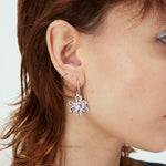 The PUFF PUFF GESTURE EARRING FIRE  available online with global shipping, and in PAM Stores Melbourne and Sydney.