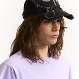 The ALIEN KISS WINGED BASEBALL CAP available online with global shipping, and in PAM Stores Melbourne and Sydney.