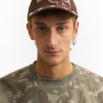 The BRICK GESTURES BASEBALL CAP available online with global shipping, and in PAM Stores Melbourne and Sydney.