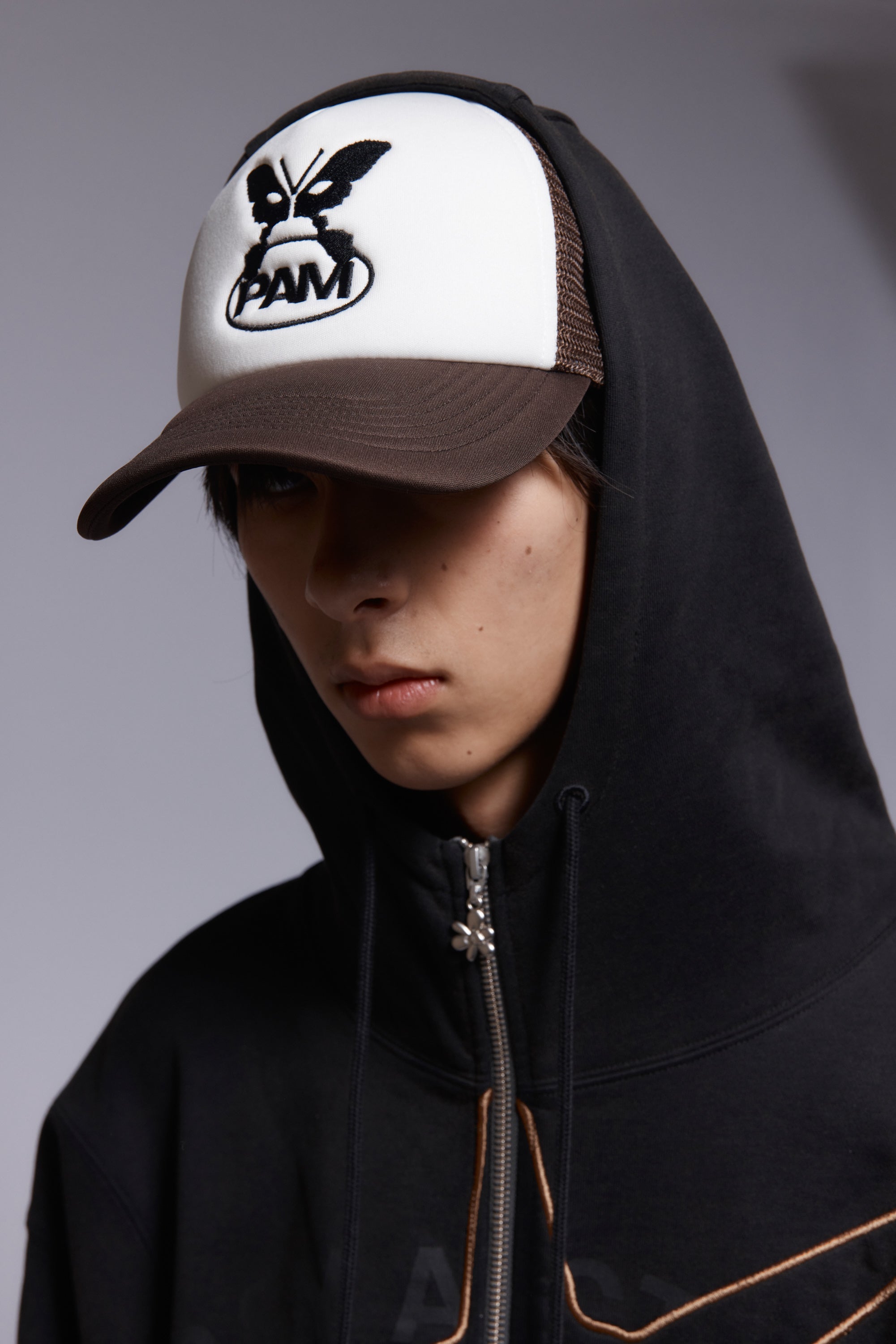 The SHAPE SHIFT HOODED ZIP THRU SWEAT available online with global shipping, and in PAM Stores Melbourne and Sydney.