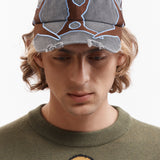 The OUTLINE LOGO CAP available online with global shipping, and in PAM Stores Melbourne and Sydney.