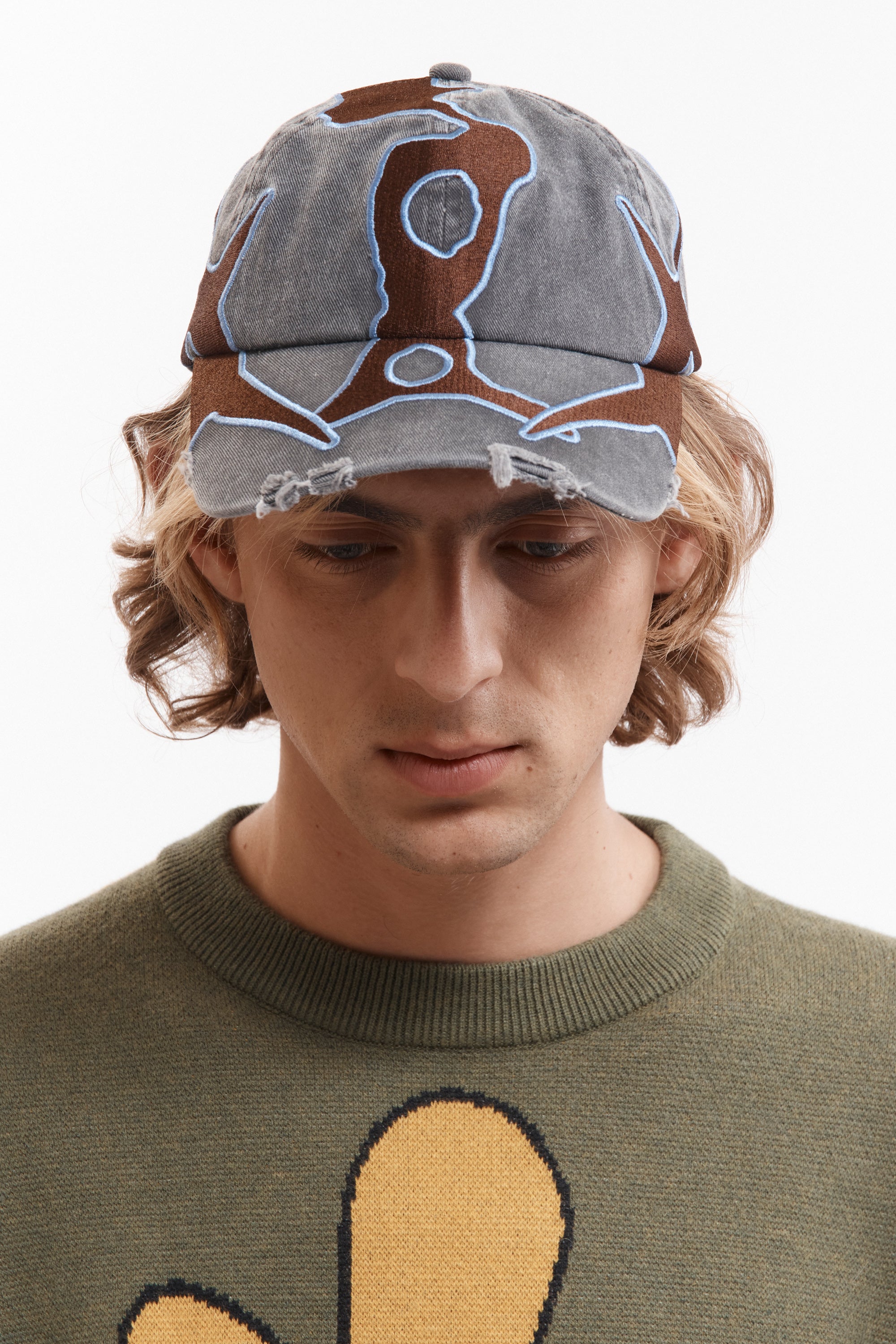 The OUTLINE LOGO CAP available online with global shipping, and in PAM Stores Melbourne and Sydney.