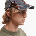 The OUTLINE LOGO CAP available online with global shipping, and in PAM Stores Melbourne and Sydney.