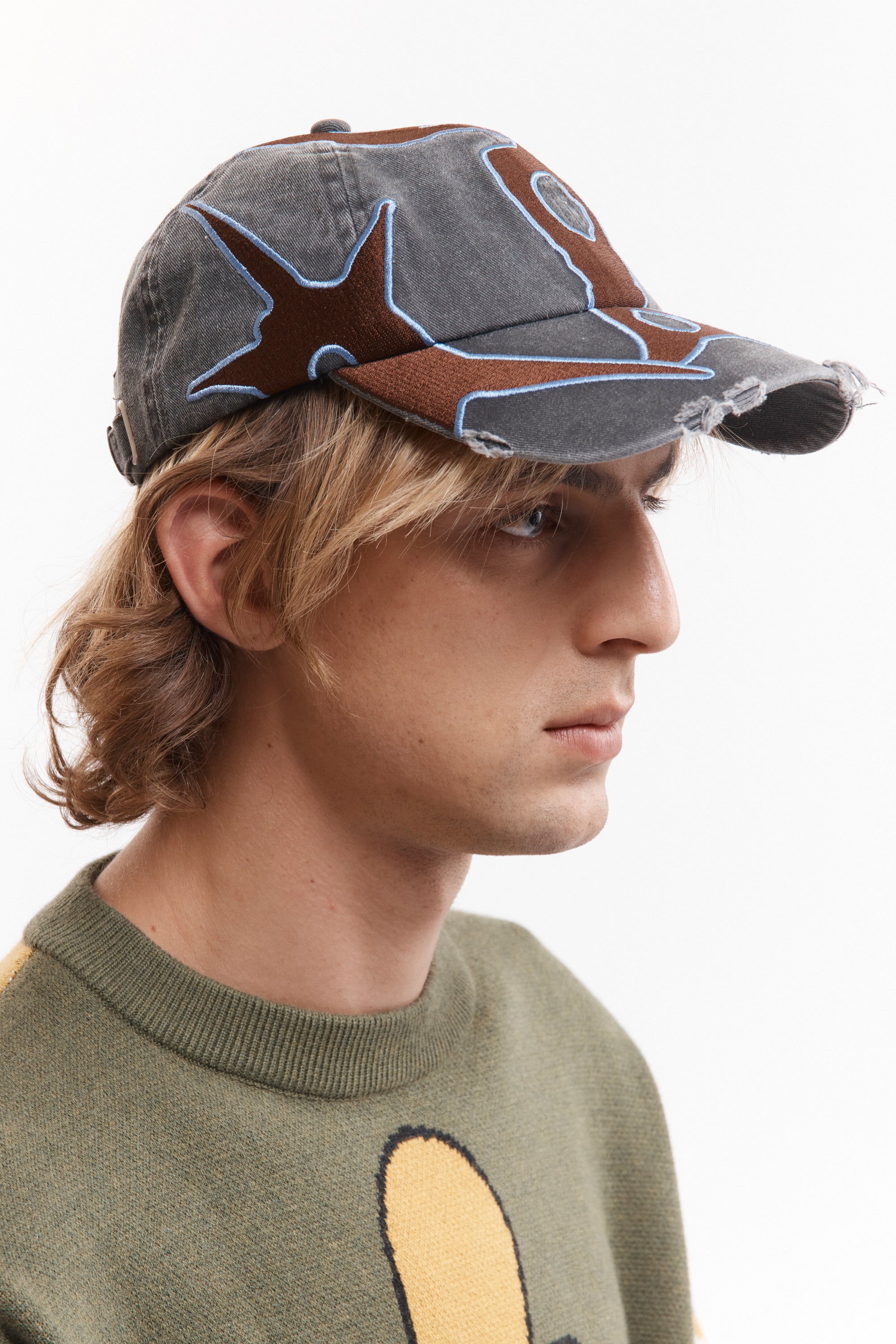 The OUTLINE LOGO CAP available online with global shipping, and in PAM Stores Melbourne and Sydney.