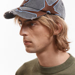 The OUTLINE LOGO CAP available online with global shipping, and in PAM Stores Melbourne and Sydney.