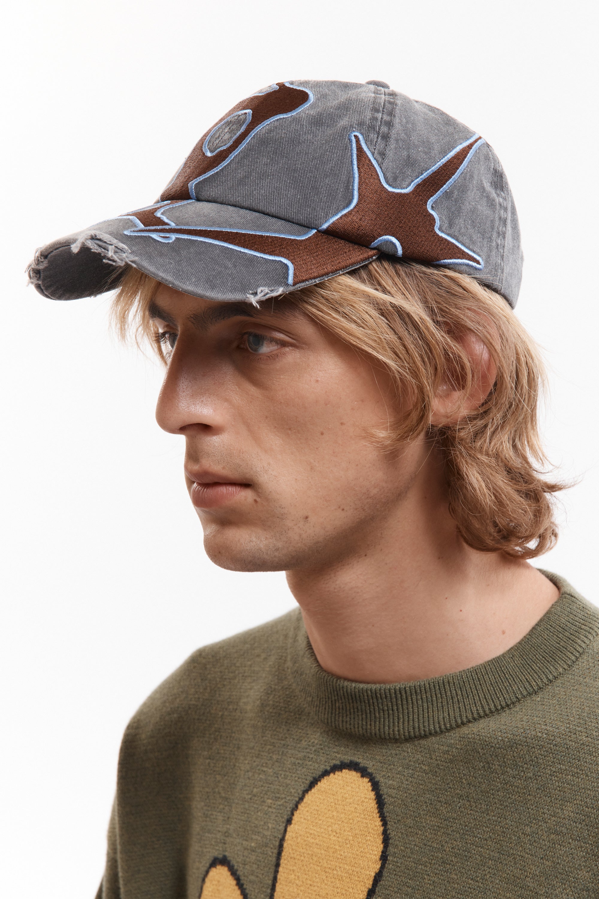 The OUTLINE LOGO CAP available online with global shipping, and in PAM Stores Melbourne and Sydney.