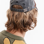 The OUTLINE LOGO CAP available online with global shipping, and in PAM Stores Melbourne and Sydney.