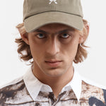 The POST HUMAN BASEBALL CAP available online with global shipping, and in PAM Stores Melbourne and Sydney.