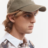 The POST HUMAN BASEBALL CAP available online with global shipping, and in PAM Stores Melbourne and Sydney.