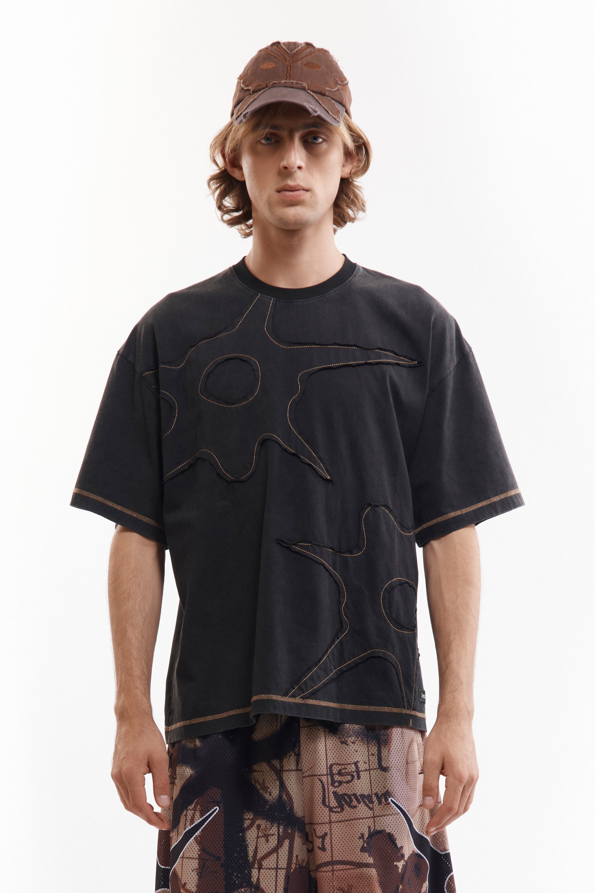 The A STITCH IN TIME SPECIALTY SS TOP available online with global shipping, and in PAM Stores Melbourne and Sydney.