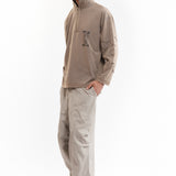 The TWO MIL PONDERING PANT - BEIGE available online with global shipping, and in PAM Stores Melbourne and Sydney.