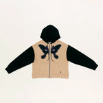 The MAGICAL DOOR CONTRAST HOODED ZIP THRU  available online with global shipping, and in PAM Stores Melbourne and Sydney.