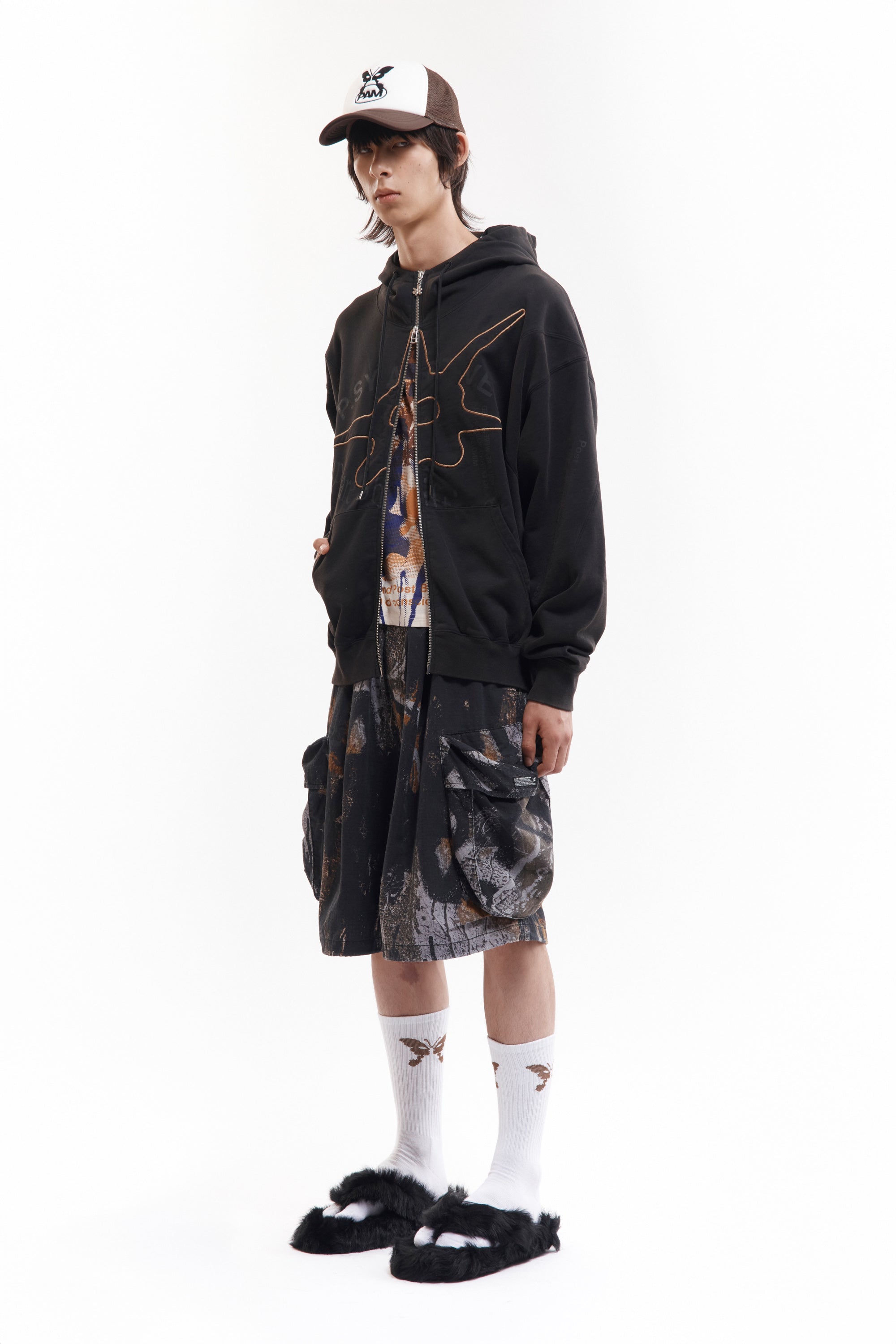 The SHAPE SHIFT HOODED ZIP THRU SWEAT available online with global shipping, and in PAM Stores Melbourne and Sydney.