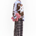 The TWO MIL GESTURES PILLOW available online with global shipping, and in PAM Stores Melbourne and Sydney.