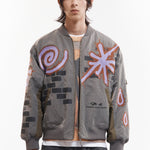 The ADORNED REVERSIBLE BOMBER JACKET available online with global shipping, and in PAM Stores Melbourne and Sydney.