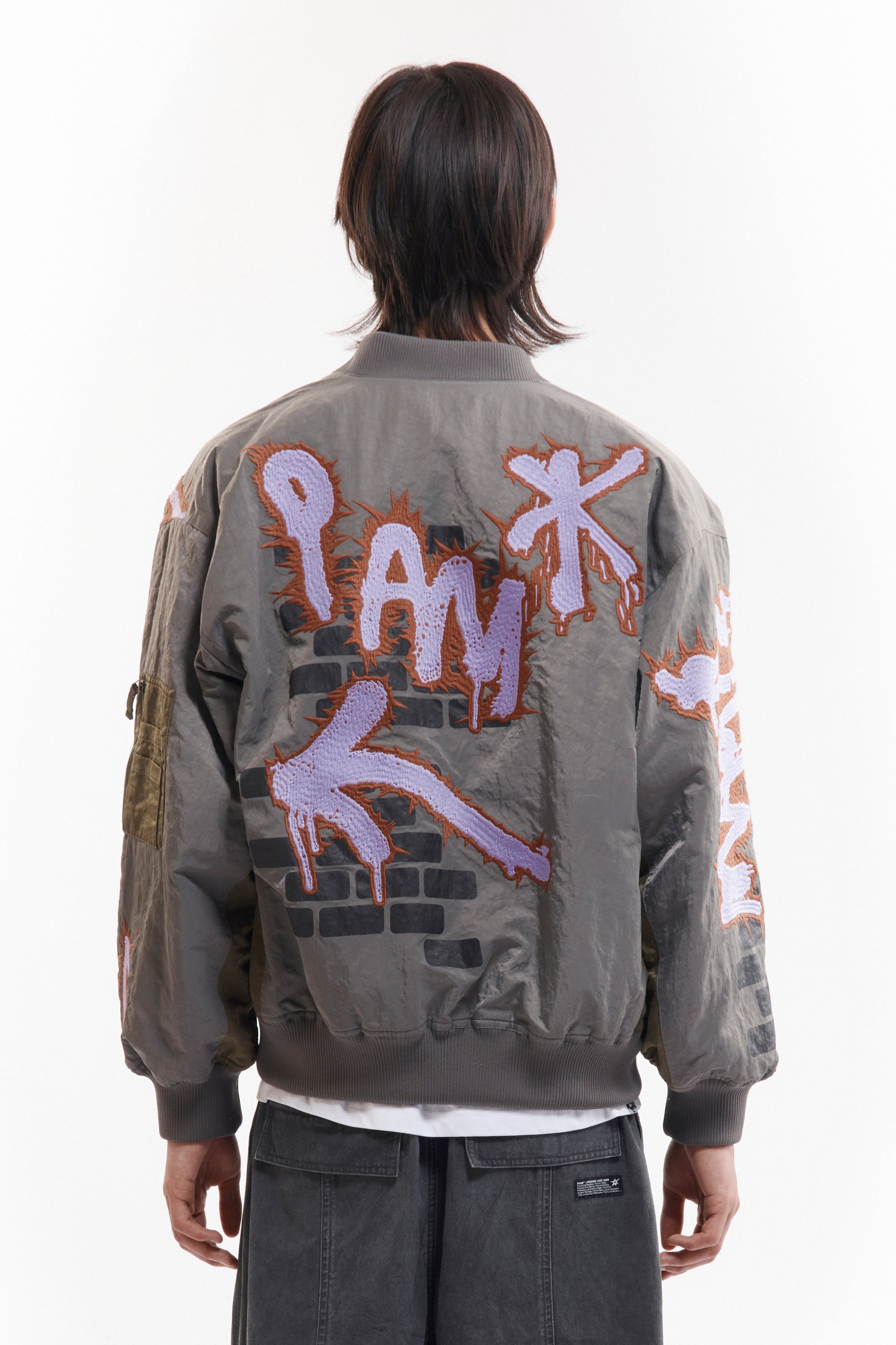 The ADORNED REVERSIBLE BOMBER JACKET available online with global shipping, and in PAM Stores Melbourne and Sydney.
