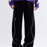 The MIRAGE TRACK PANT - BLACK available online with global shipping, and in PAM Stores Melbourne and Sydney.