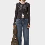 The KOSMIC KISS ZIPPED CARDIGAN available online with global shipping, and in PAM Stores Melbourne and Sydney.