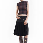 The SPIRAL JETTY PLEAT SKIRT available online with global shipping, and in PAM Stores Melbourne and Sydney.
