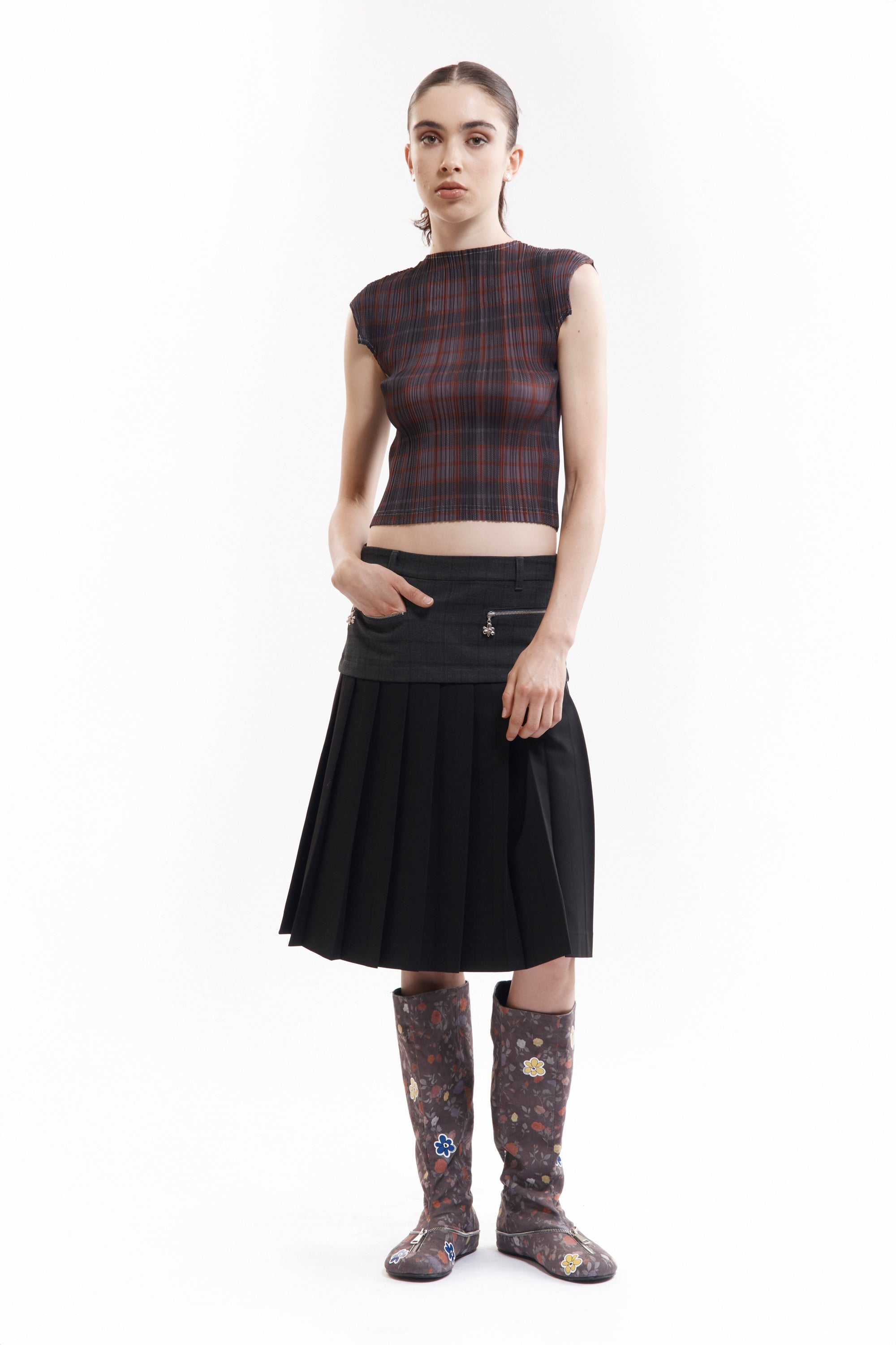 The SPIRAL JETTY PLEAT SKIRT available online with global shipping, and in PAM Stores Melbourne and Sydney.