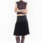 The SPIRAL JETTY PLEAT SKIRT available online with global shipping, and in PAM Stores Melbourne and Sydney.