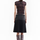 The SPIRAL JETTY PLEAT SKIRT available online with global shipping, and in PAM Stores Melbourne and Sydney.