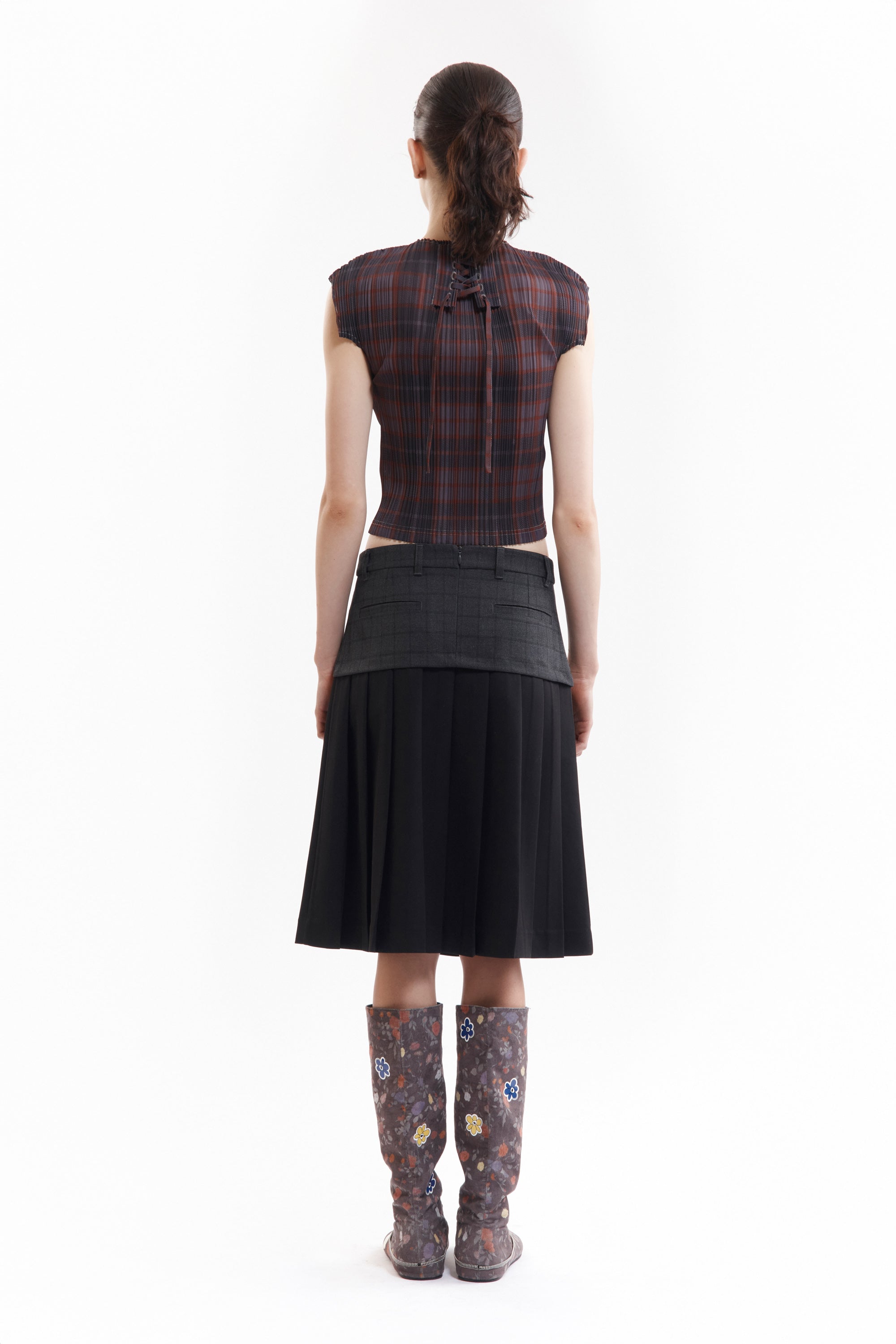 The SPIRAL JETTY PLEAT SKIRT available online with global shipping, and in PAM Stores Melbourne and Sydney.