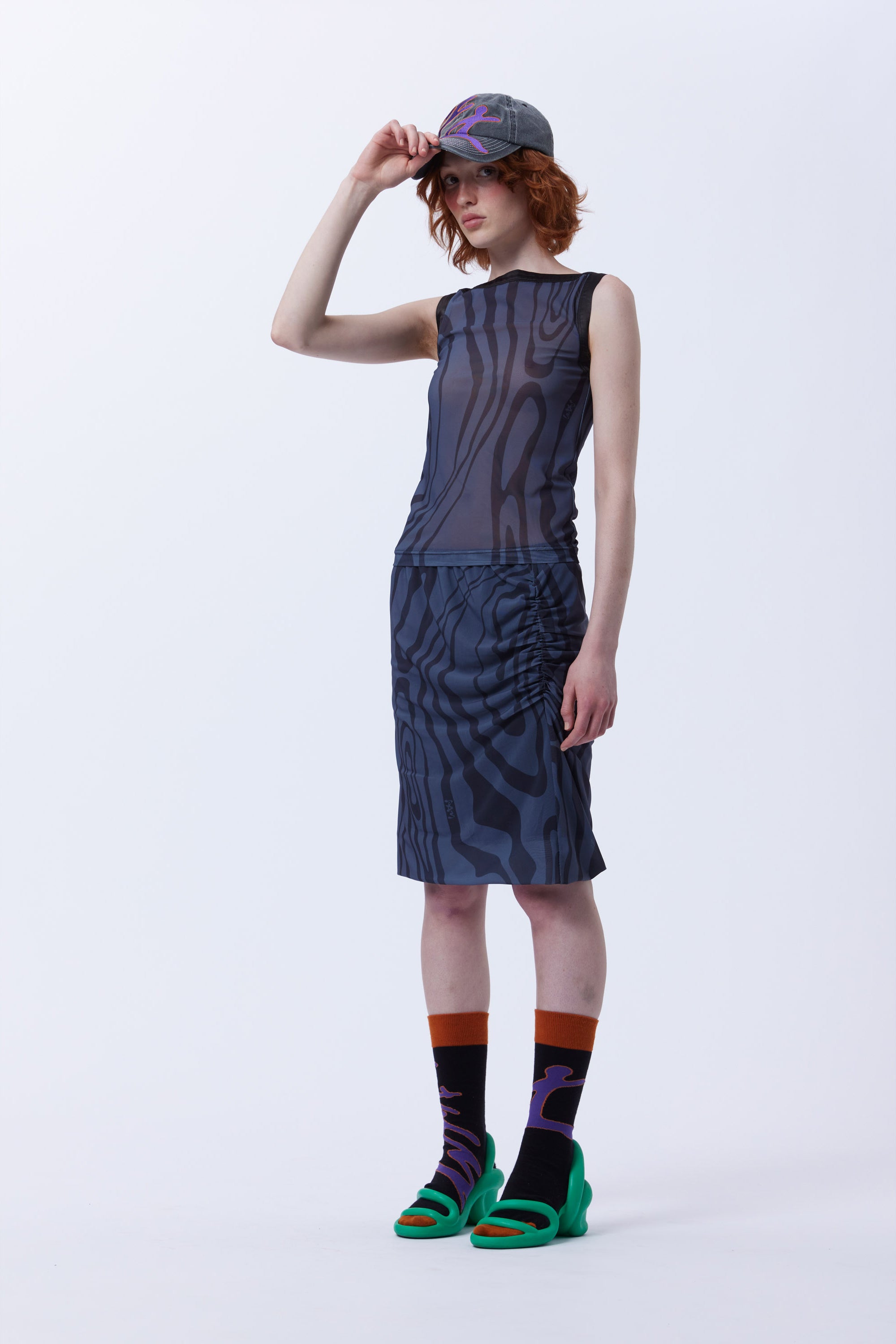 The RIPPLE MESH GATHERED SKIRT  available online with global shipping, and in PAM Stores Melbourne and Sydney.