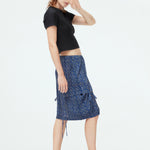 model wearing monogram skirt side view