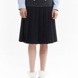 The SPIRAL JETTY PLEAT SKIRT available online with global shipping, and in PAM Stores Melbourne and Sydney.