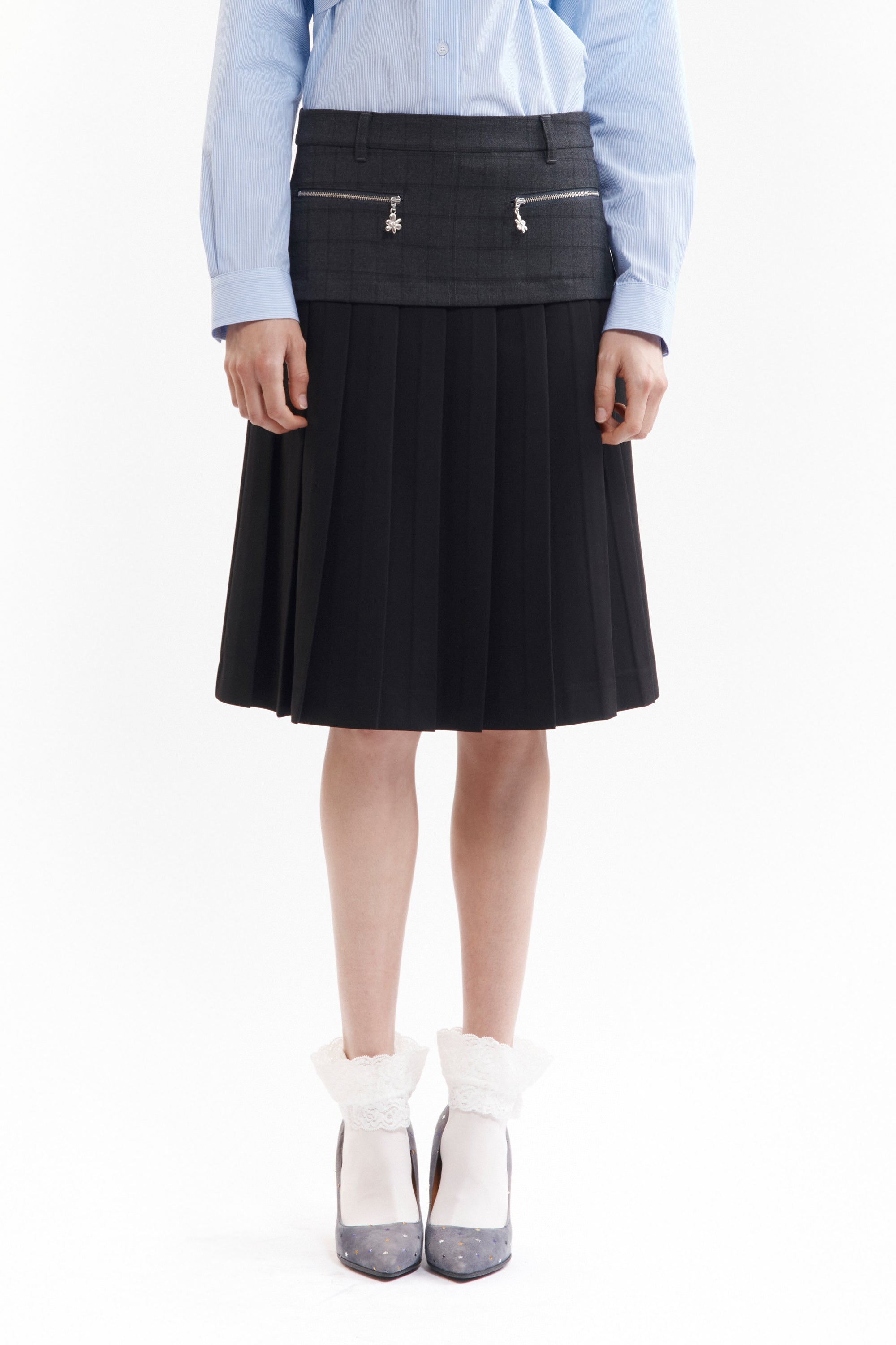 The SPIRAL JETTY PLEAT SKIRT available online with global shipping, and in PAM Stores Melbourne and Sydney.