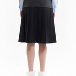 The SPIRAL JETTY PLEAT SKIRT available online with global shipping, and in PAM Stores Melbourne and Sydney.