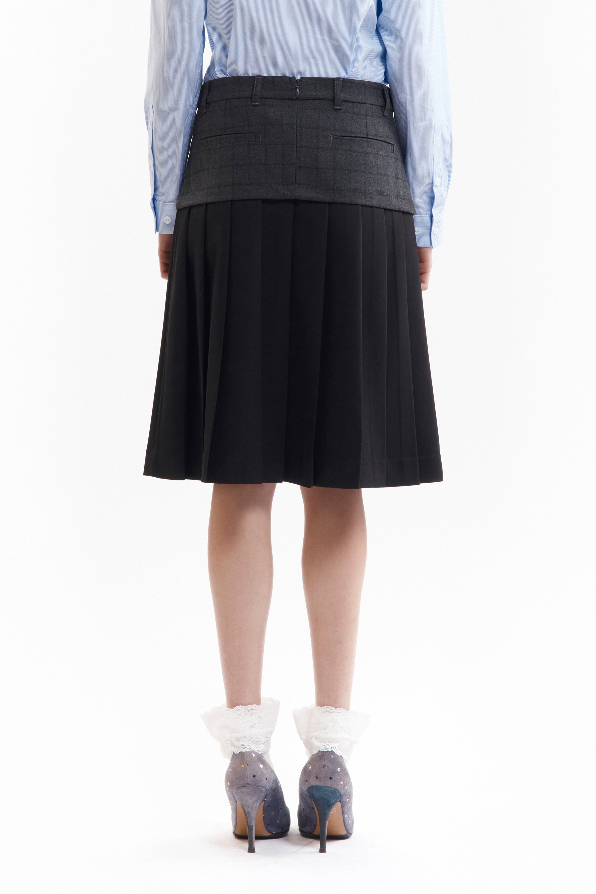 The SPIRAL JETTY PLEAT SKIRT available online with global shipping, and in PAM Stores Melbourne and Sydney.