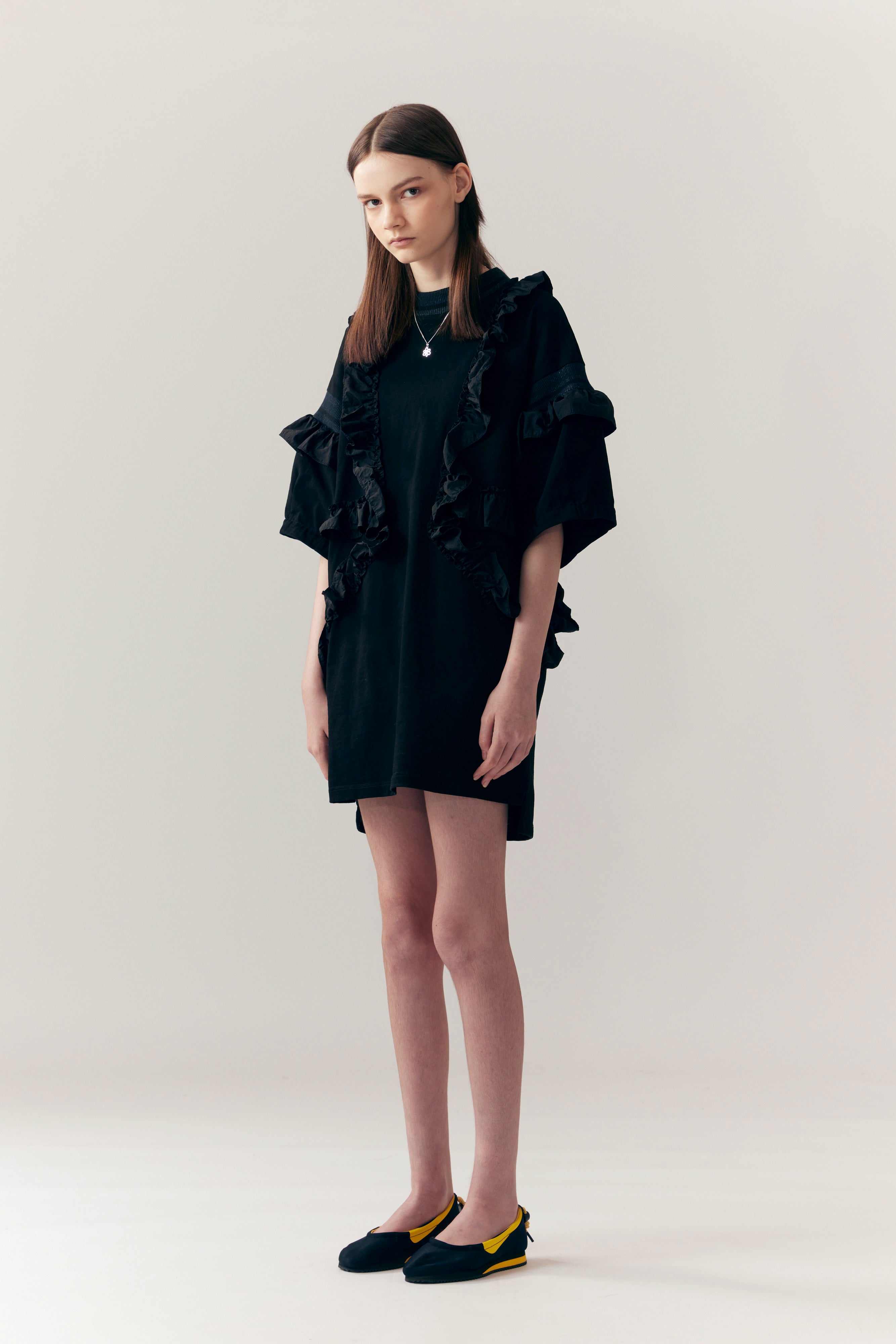 The ELYSIA RUFFLE DRESS  available online with global shipping, and in PAM Stores Melbourne and Sydney.