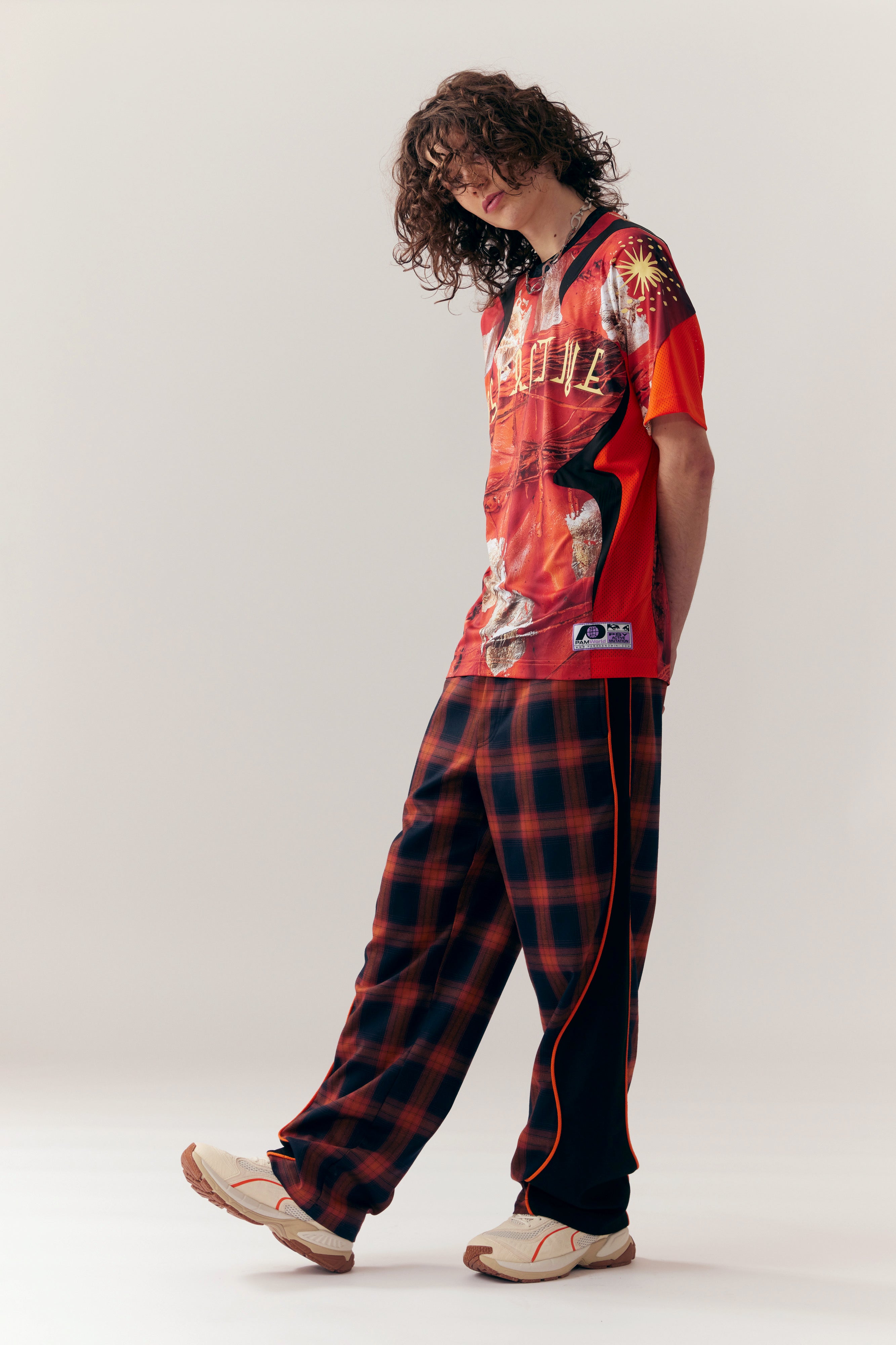 The MIRAGE PLAID TRACKPANT  available online with global shipping, and in PAM Stores Melbourne and Sydney.