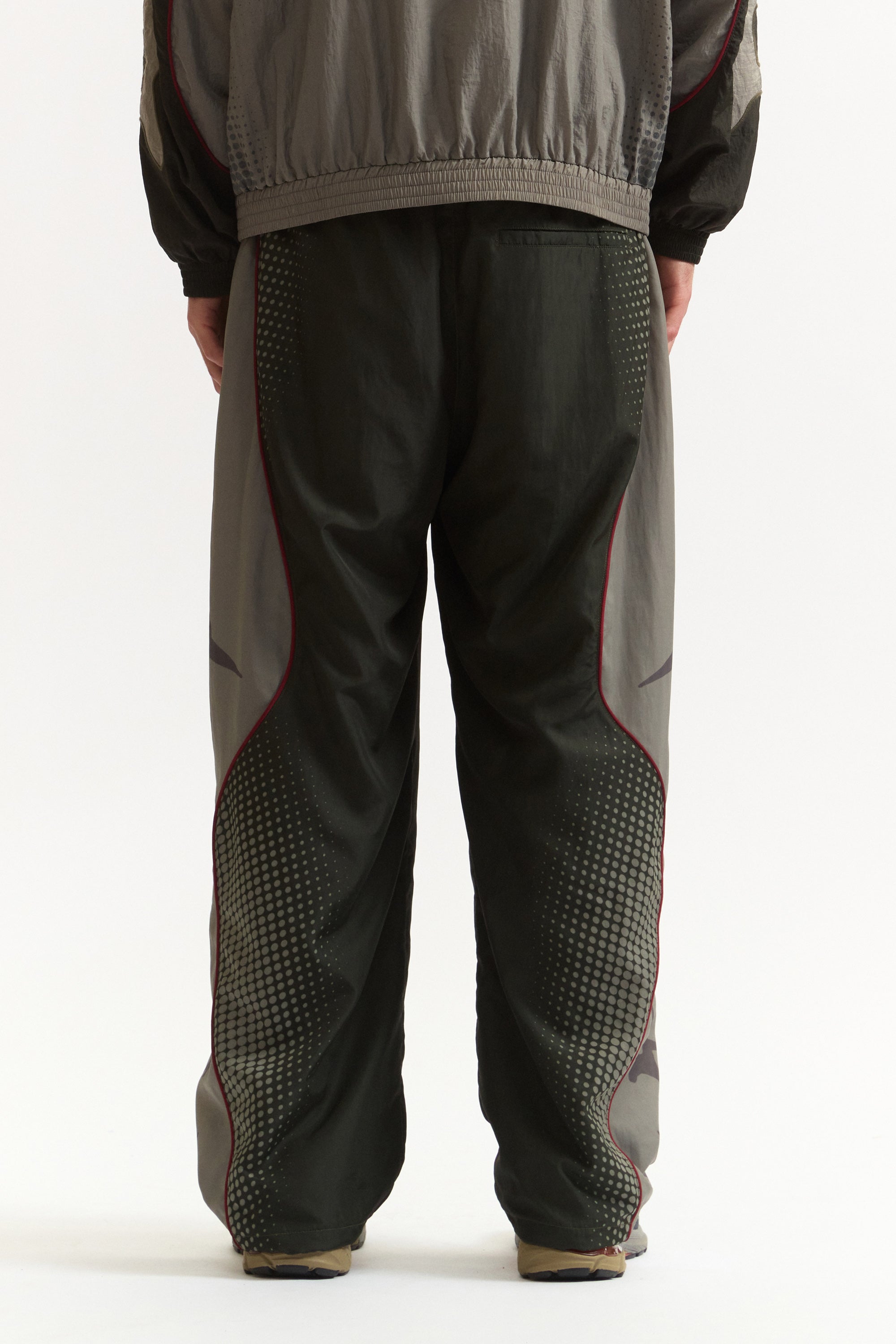 The AGGREGATE TRACK PANTS available online with global shipping, and in PAM Stores Melbourne and Sydney.