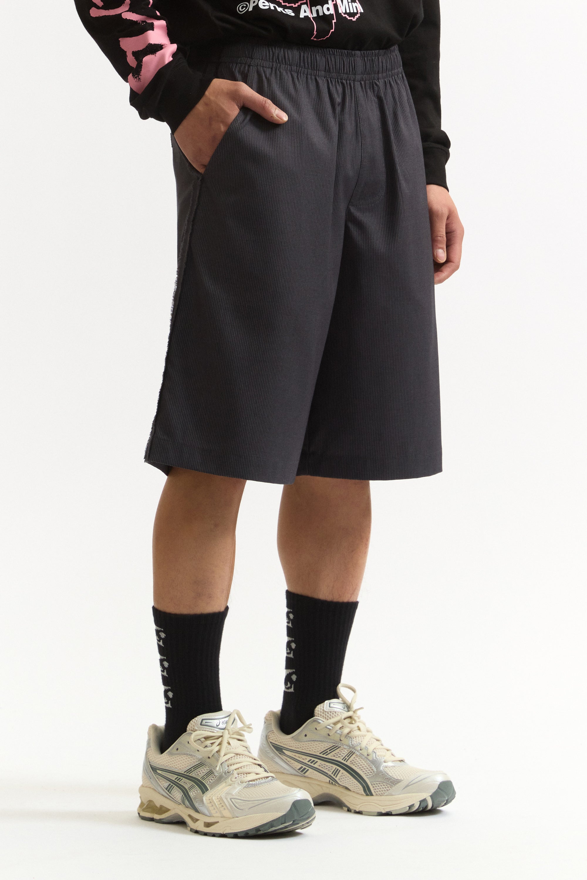 The PINSTRIPED A RUSSELL SHORTS available online with global shipping, and in PAM Stores Melbourne and Sydney.